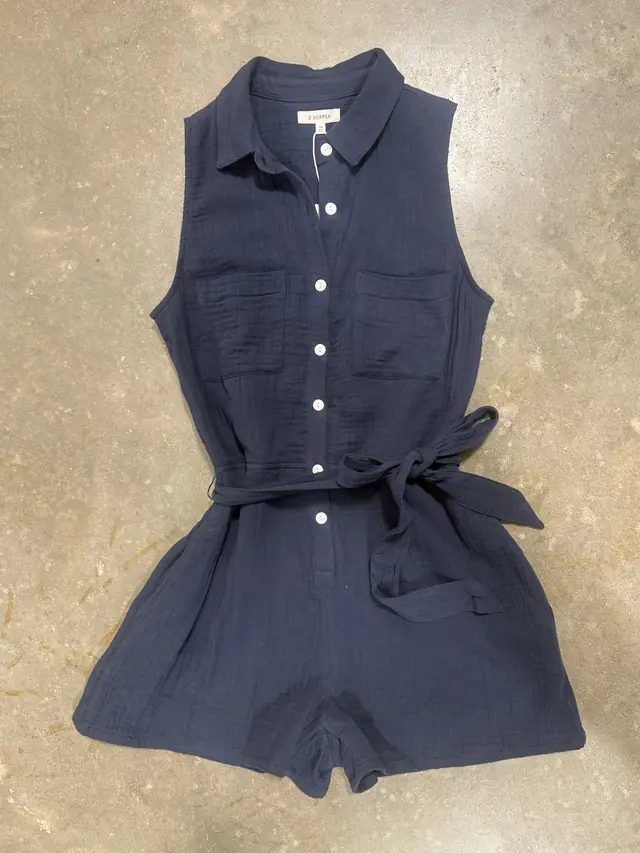 Original romper photo laid flat and shot from above